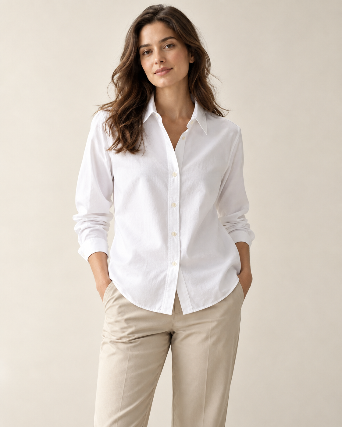 Woman wearing Maison Elin classic button-front shirt in white